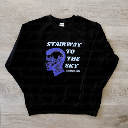 Black sweatshirt with a graphic design and text on a wooden surface