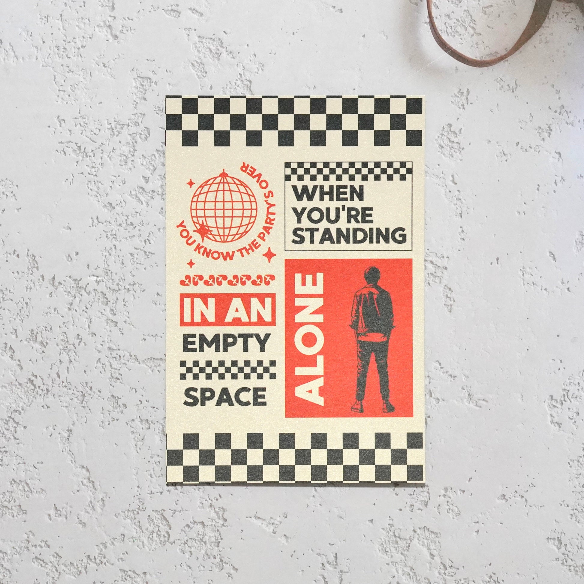Louis Tomlinson Poster with text and graphic design on a textured surface
