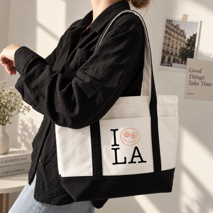 Black personalized canvas tote bag with custom LA city design and orange snail mail graphic