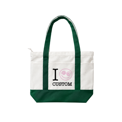 Green personalized canvas tote bag with custom text and pink snail design on white background